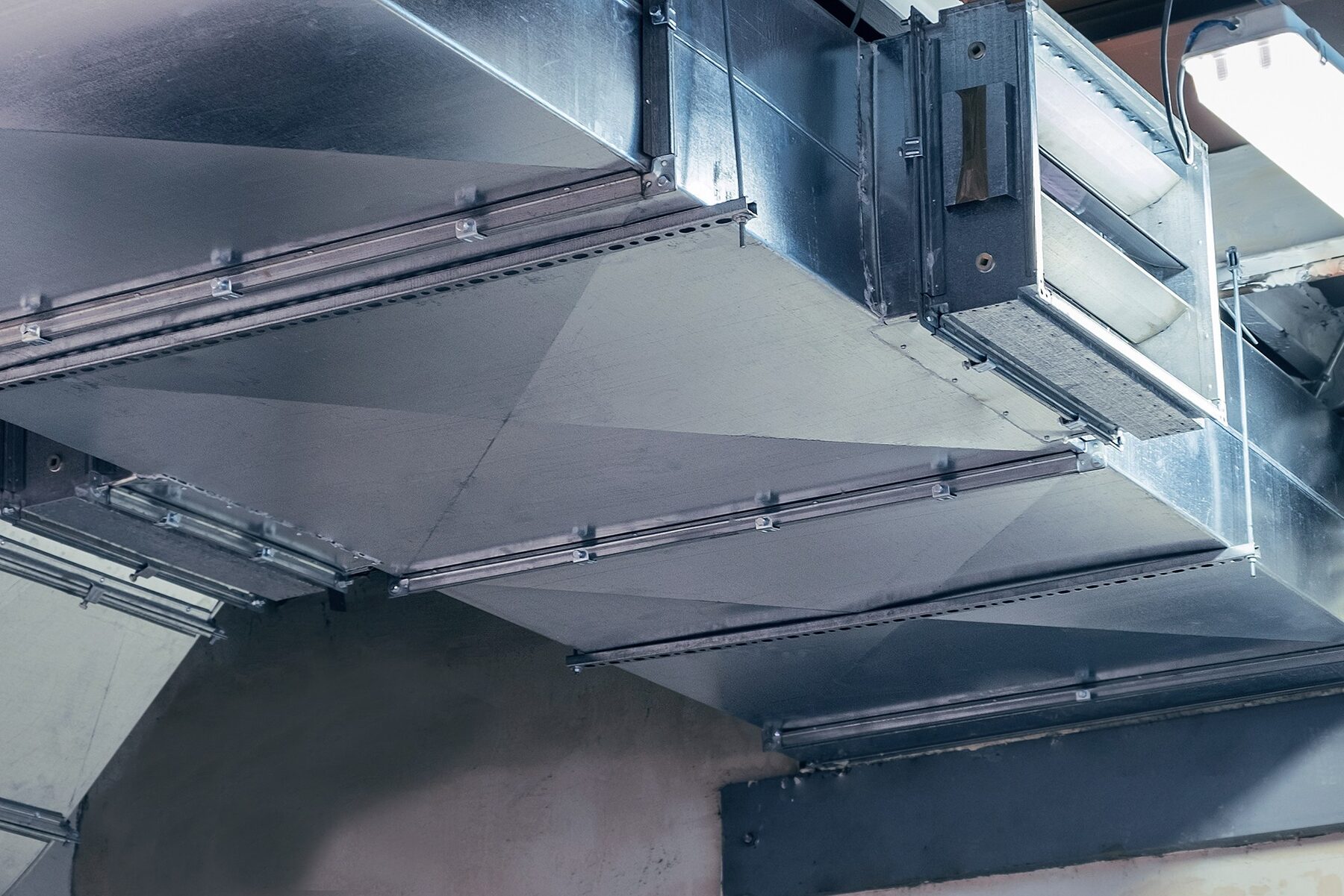 Commercial duct system being balanced and measured